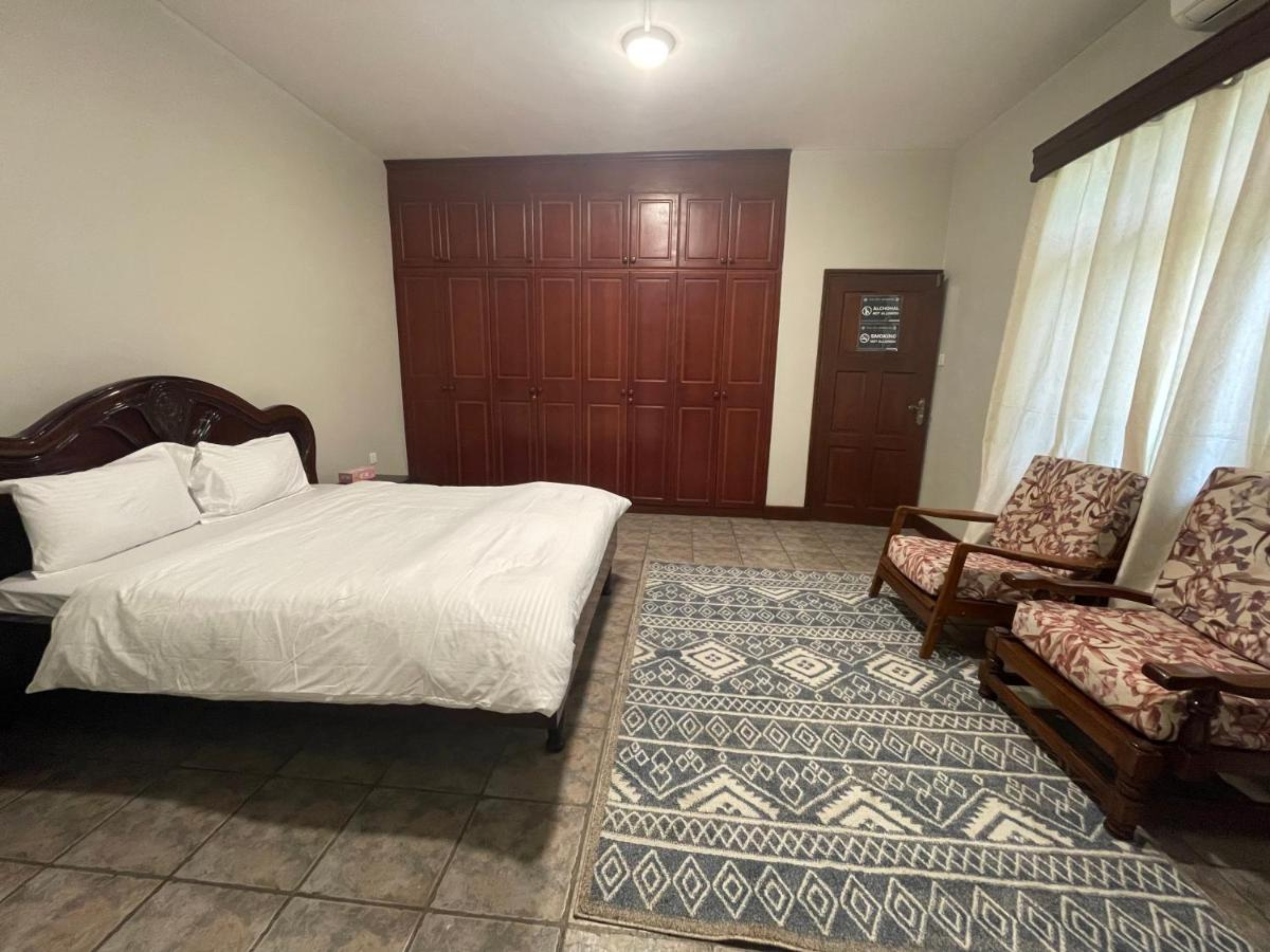 Deluxe Double Room with Balcony at Olivia Guesthouse